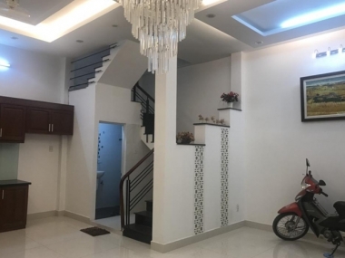 Bán nhà mặt tiền đường số Tân Quy sổ hồng, diện tích 4.8x18m, giá 8.8 tỷ. LH 0909477288.